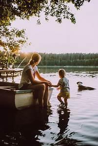 A person and a child on a boat in the water

Description automatically generated with medium confidence