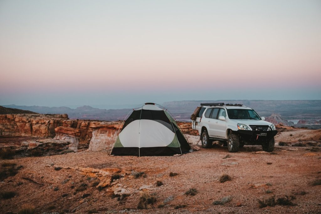 list of hobbies includes camping and outdoor activities.  Car camping and text near expansive view of desert