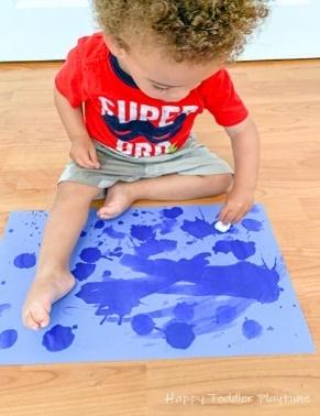 Painting with cotton balls and water for toddlers