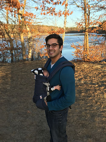 Wike Dad with tiny baby in front carrier.