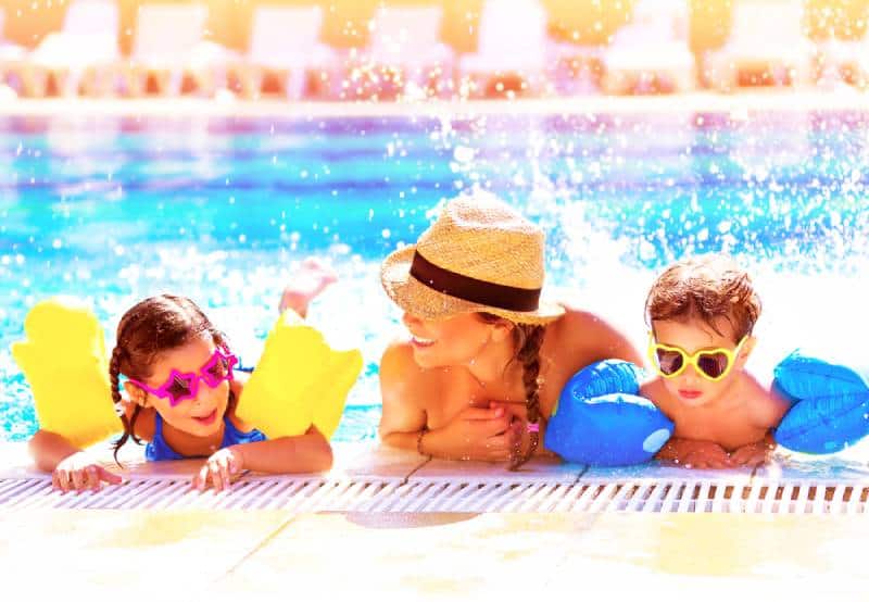  cheerful family having fun in aquapark