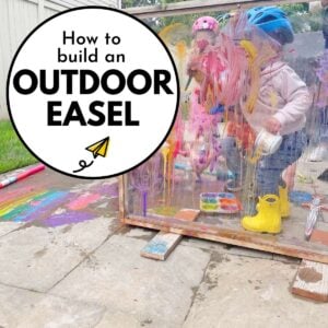 An 18 month old paints on an outdoor easel. How to build an outdoor easel (text)