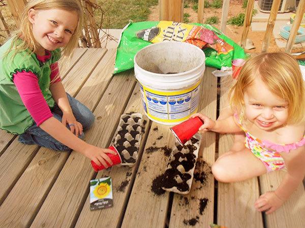A picture containing person, little, child, table

Description automatically generated