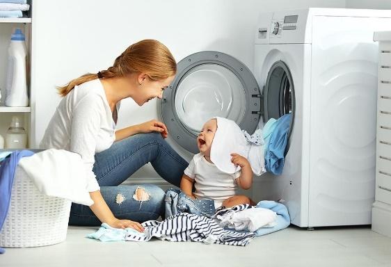 A picture containing person, white goods, appliance, clothes dryer

Description automatically generated
