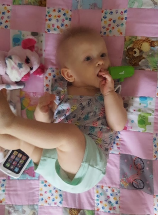 A picture containing person, baby, indoor, little

Description automatically generated