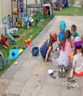 A group of children playing outside
Description automatically generated with low confidence