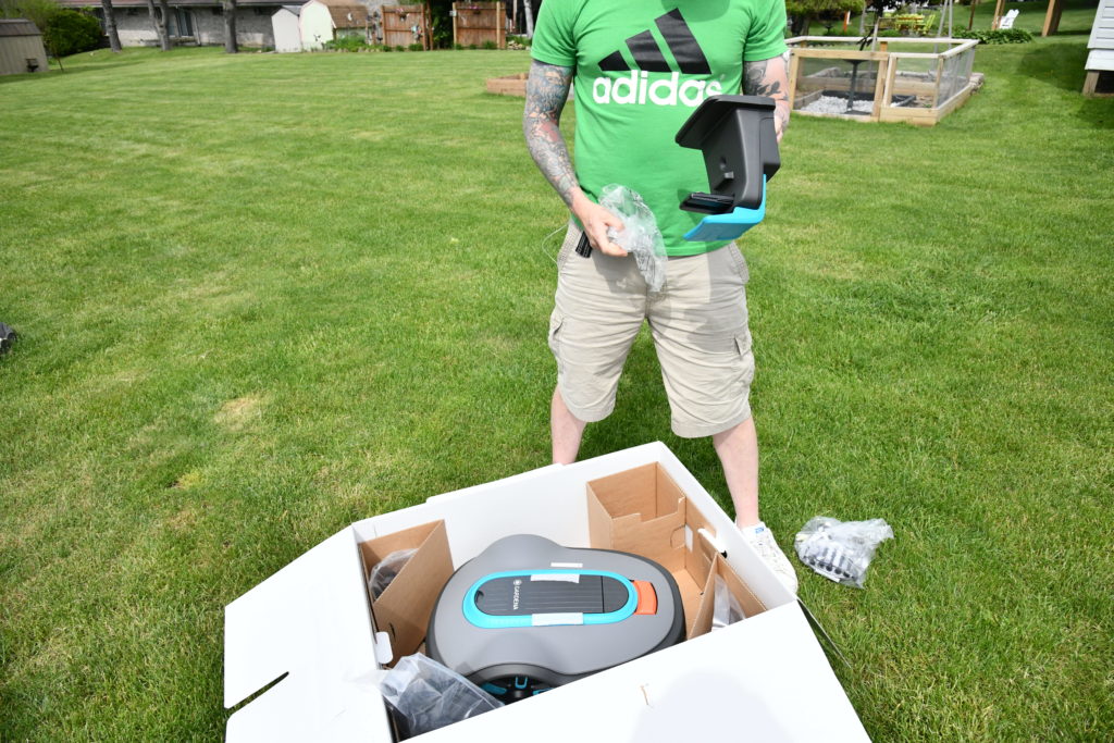7 Ways To Get Your Yard Ready for Summer opening gardena mower box