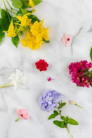Fresh flowers including Esperanza, plumbago, roses, vincas and crepe myrtle blooms