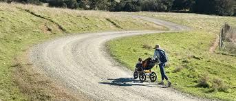 A picture containing grass, outdoor, road, bicycle

Description automatically generated
