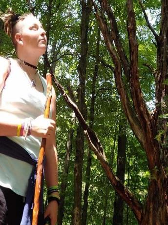 A picture containing tree, outdoor, person, plant

Description automatically generated