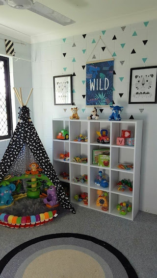 This may contain: an outdoor display with rocks and other items
